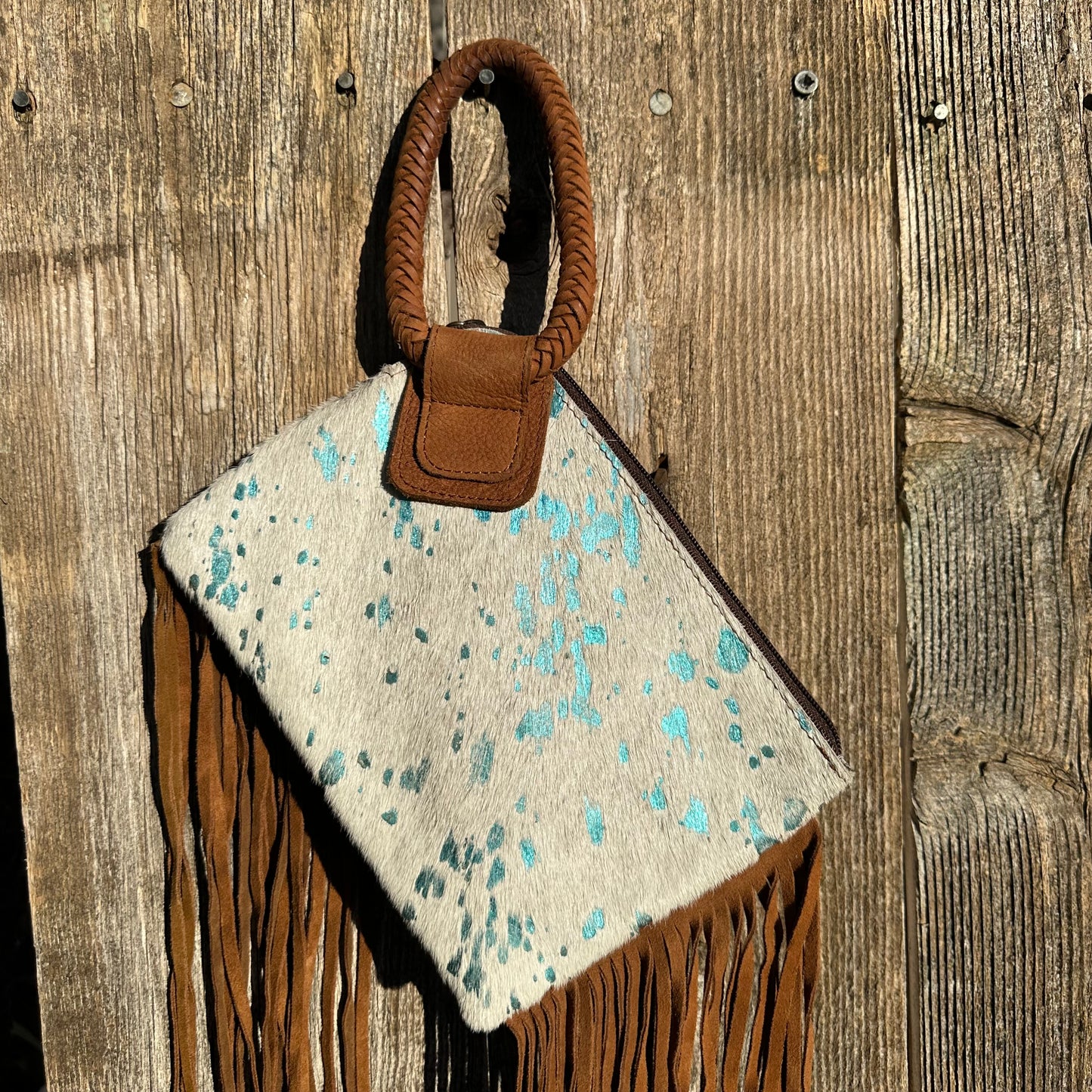 White and Teal Cowhide Clutch Purse